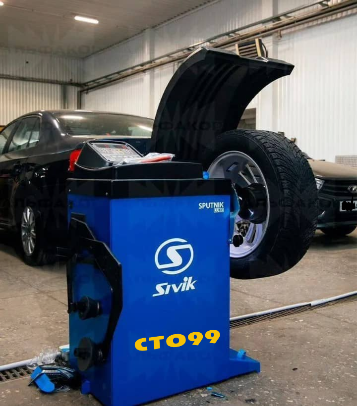 Работа станка для балансировки колес